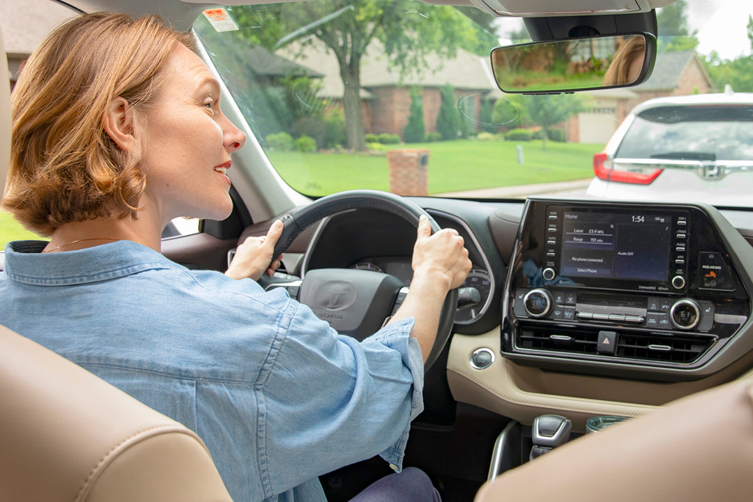 A woman driving a vehicle.