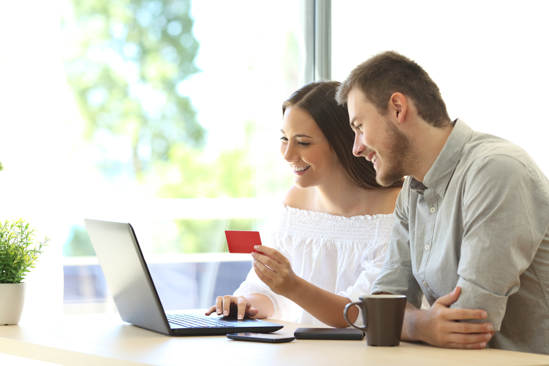 High school boy and girl shopping online